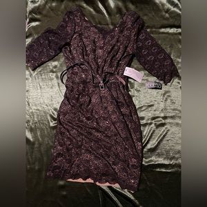 Beautiful dress with sequence, mid length.